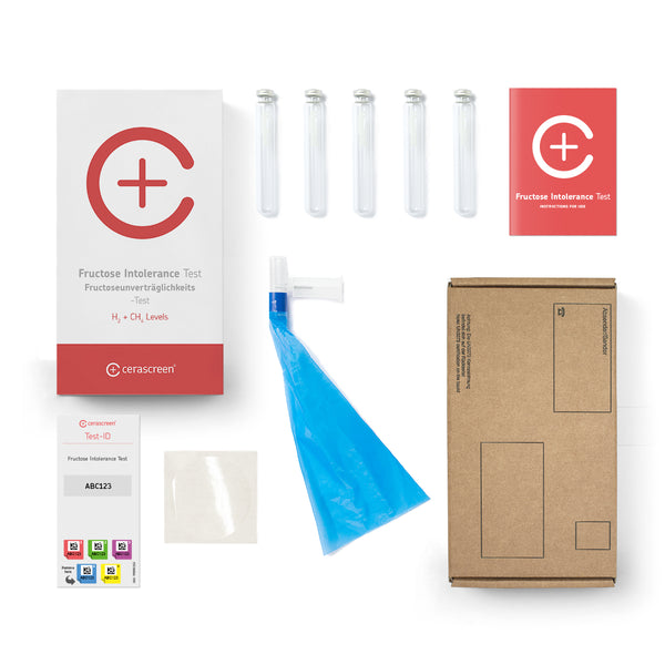 Inhalt des Fructoseintoleranz Testkits von cerascreen: Verpackung, Anleitung, Mundstück mit Luftbeutel, Probenröhrchen, Rücksendeumschlag